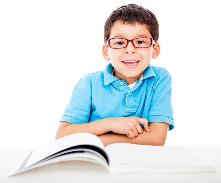 Geeky little boy studying and wearing glasses - isolated over a white background